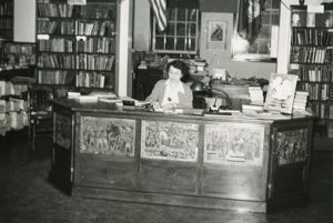 Dorris Parker presides at the circulation desk. 