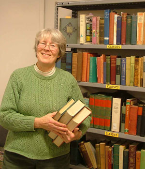 Ellie Andy preparing for a Friends' Book Sale.